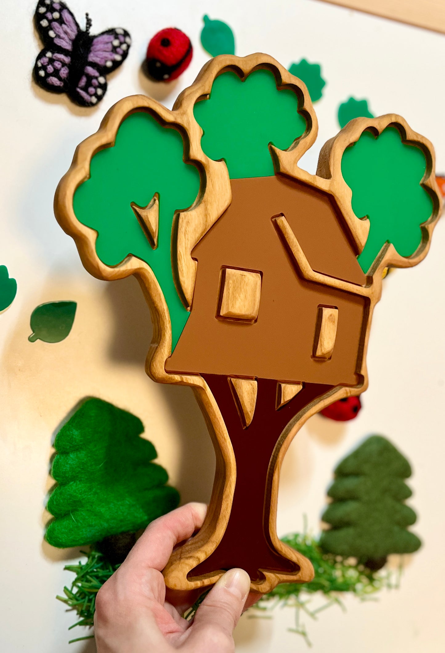 Handmade treehouse tray with dry erase inserts on a light background