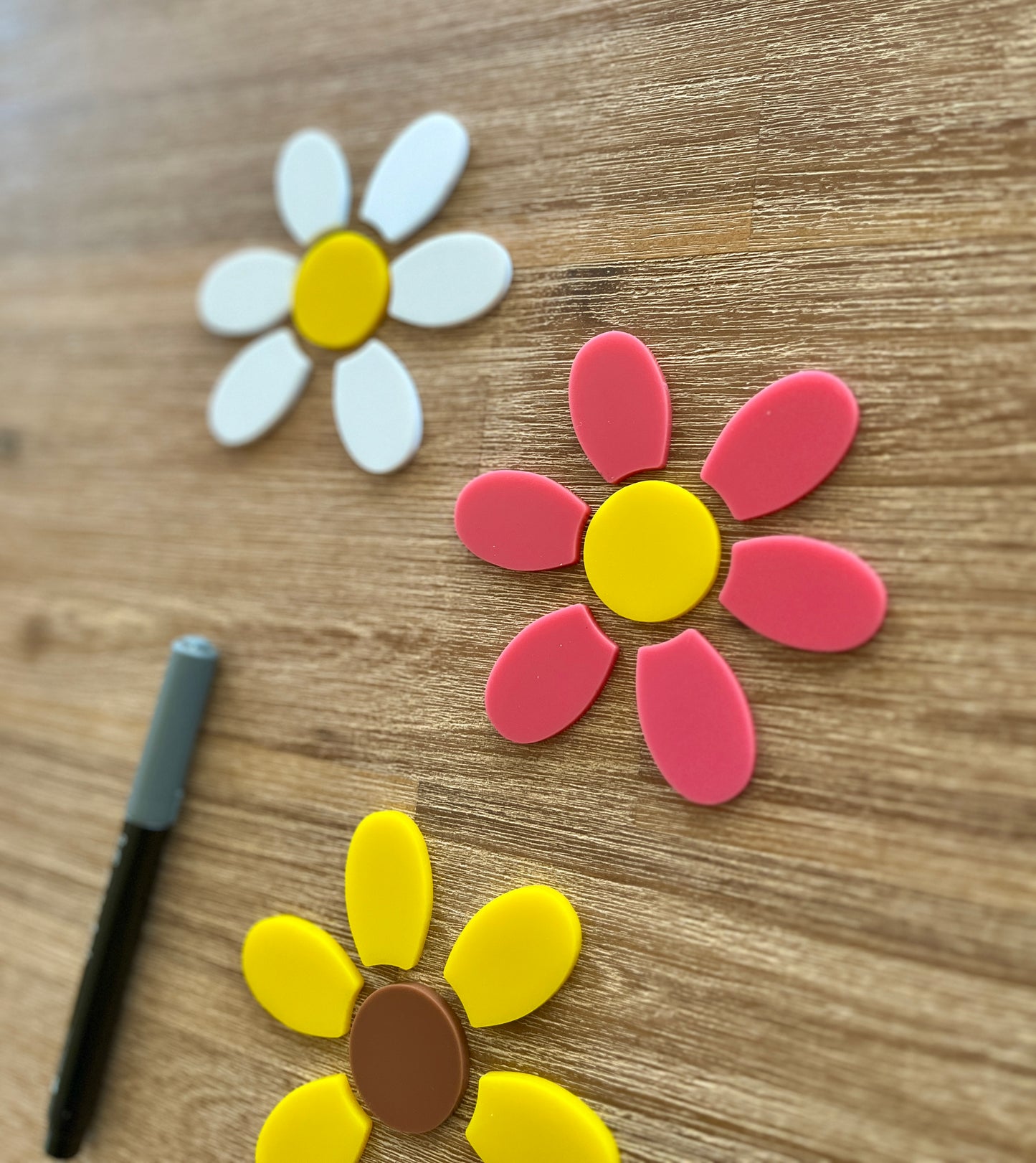 Little Dry Erasables - 7 Part Daisy Flowers; 3 Sets featuring colorful flower pieces in white, pink, and yellow for creative assembly and learning, handcrafted, homeschool, education resources.