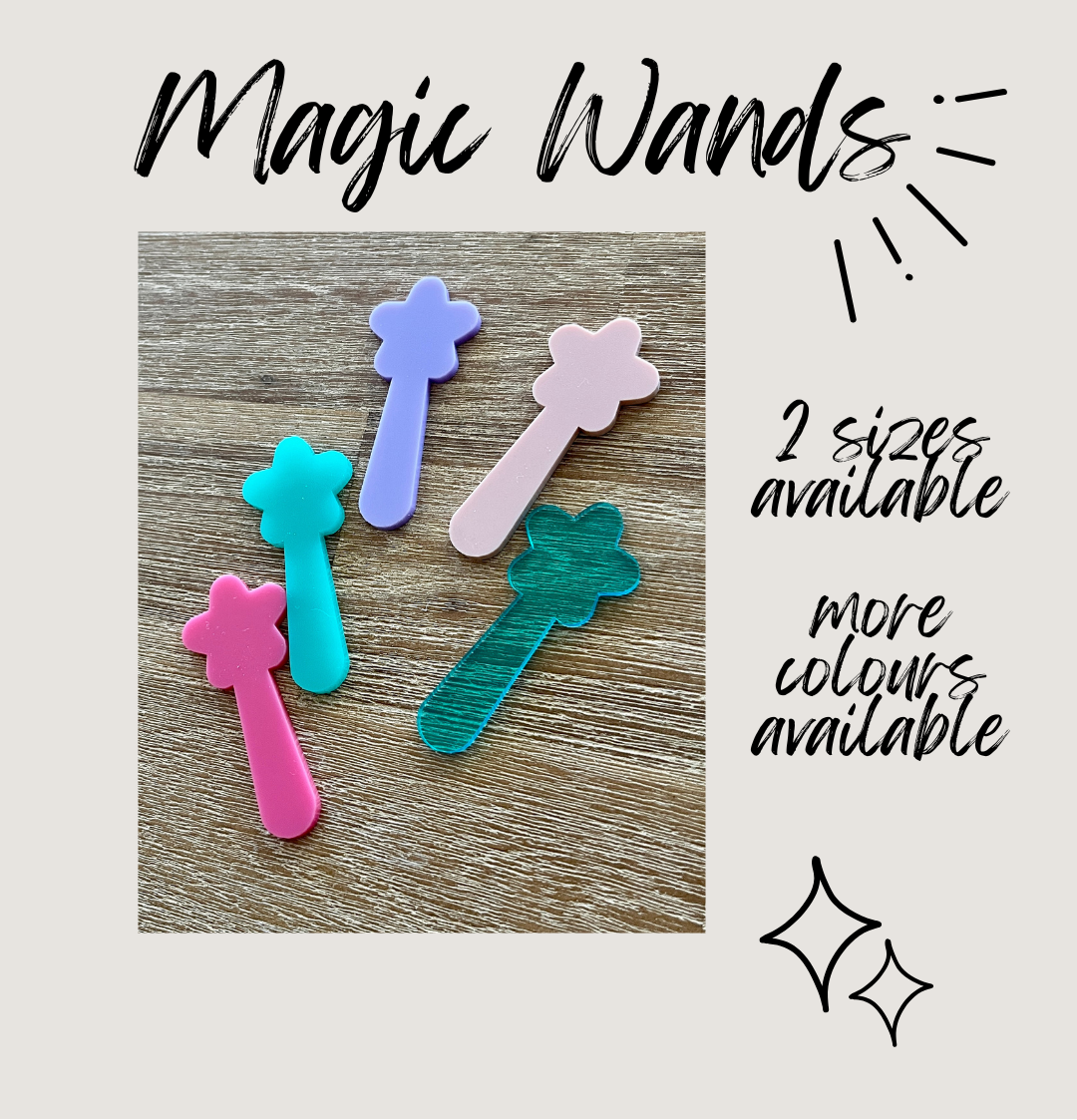 Colorful magic wands on a wooden surface with text indicating sizes and color availability.