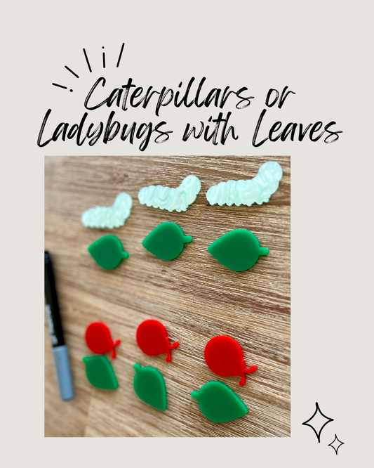 Transparent green caterpillar shapes paired with solid green leaves and bright red ladybugs on a wooden surface, Little Dry Erasables - Caterpillars or Ladybugs with Leaves, handcrafted, homeschool, education resources.