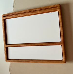Smaller wooden multipurpose sensory tray with two white dry erase inserts, one large and one narrow on wood surface