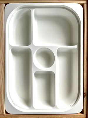 White Flisat sorting tray with multiple compartments designed for trofast and Flisat table and shelves
