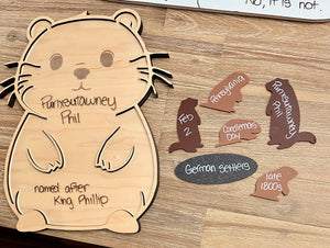 Little Dry Erasables - Groundhog Day set featuring a wooden groundhog board with labeled facts and separate wooden pieces shaped like groundhogs and signs, handcrafted homeschool education resources.