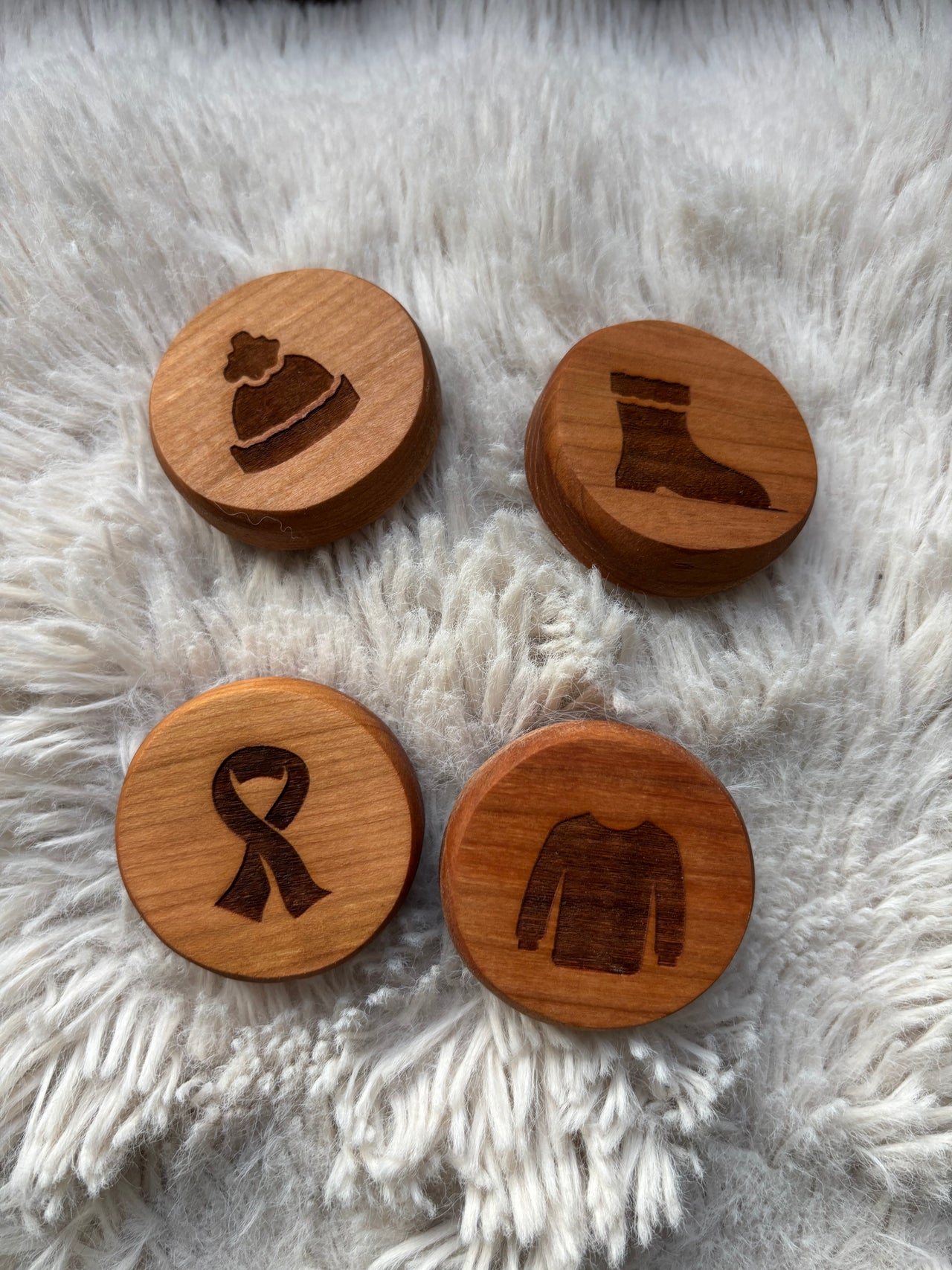 Ready to Ship, Playdough Stampers Winter Clothing featuring handcrafted wooden stampers with engraved winter apparel shapes including a beanie, boot, scarf, and sweater, unique homeschool educational resources and wood toys.