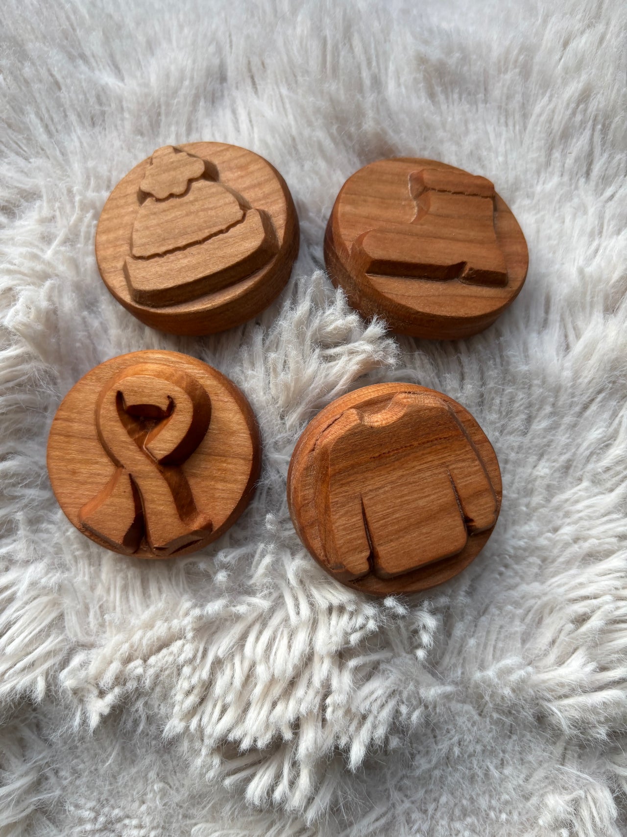 Ready to Ship, Playdough Stampers Winter Clothing featuring handcrafted wooden stampers with carved winter wear designs including a beanie, mitten, scarf, and sweater, handcrafted homeschool education resources and wood toys.
