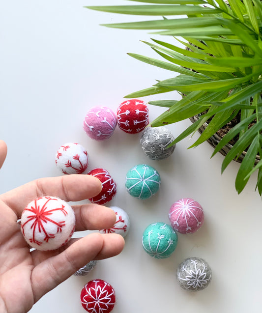 One White Felt Snowflake Ball