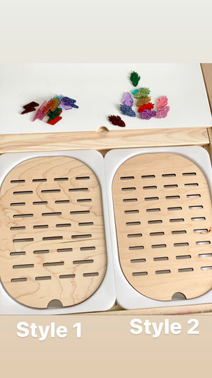 Two wooden Flisat table top inserts with slots showing Style 1 and Style 2 with colorful sorting pieces on white surface