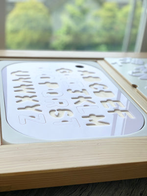 Uppercase alphabet puzzle insert with white acrylic letters set in maple plywood frame for Flisat bins tabletop use