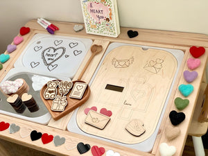 Wooden Love Post Mail Box Flisat table top insert with Valentine’s Day-themed wooden tokens and felt hearts on light wood table
