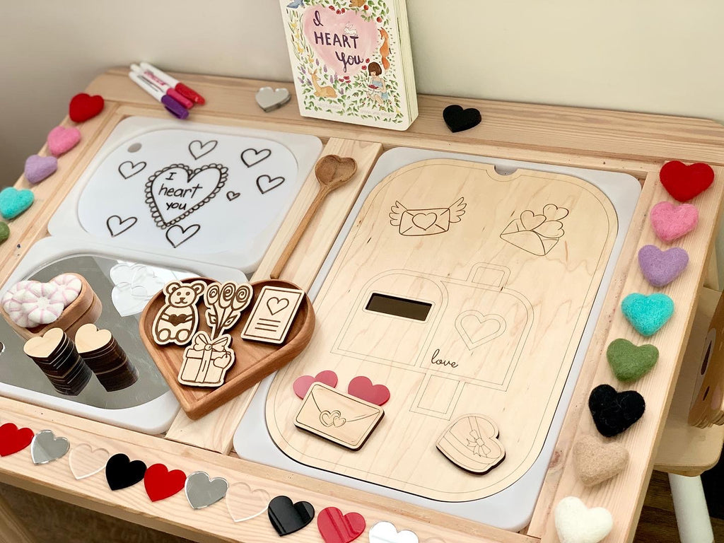 Wooden Love Post Mail Box Flisat table top insert with Valentine’s Day-themed wooden tokens and felt hearts on light wood table