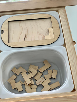 Small wooden puzzle Flisat table top insert with natural wood pieces inside white plastic bin tray